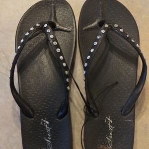 Black flip flops